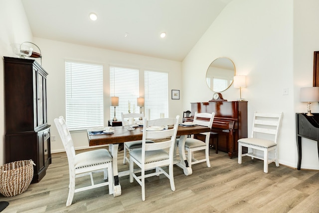 541 Green Meadows Dr, West Columbia, TX 77486 - dining area with vaulted ceiling, light wood-style floors, and recessed lighting