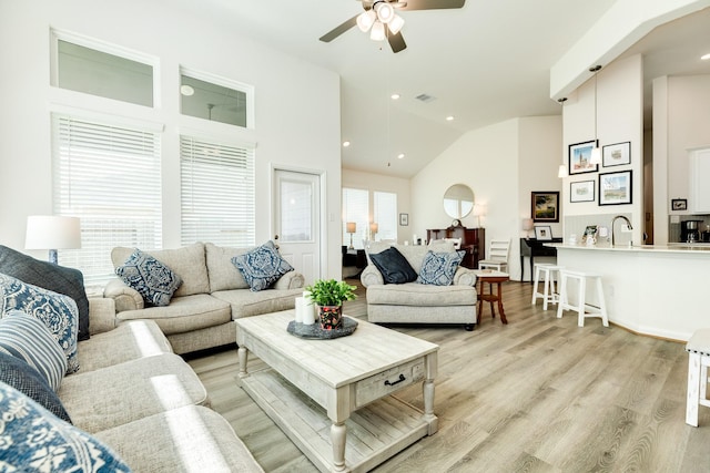 541 Green Meadows Dr, West Columbia, TX 77486 - living room with ceiling fan, light wood-type flooring, high vaulted ceiling, and recessed lighting