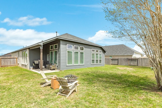 541 Green Meadows Dr, West Columbia, TX 77486 - rear view of house with an outdoor fire pit, a fenced backyard, and a patio