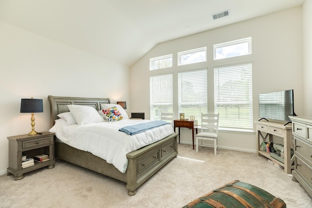 541 Green Meadows Dr, West Columbia, TX 77486 - bedroom featuring multiple windows, light colored carpet, and lofted ceiling