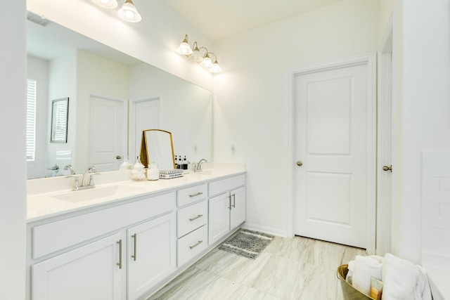 541 Green Meadows Dr, West Columbia, TX 77486 - bathroom with double vanity and baseboards