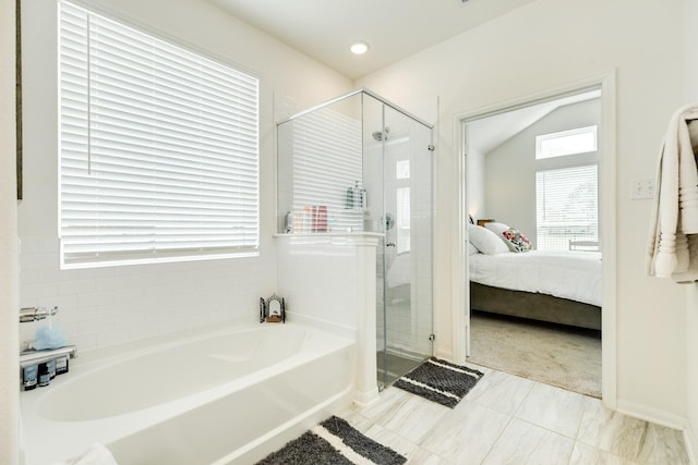 541 Green Meadows Dr, West Columbia, TX 77486 - bathroom featuring a garden tub, a shower stall, ensuite bath, and lofted ceiling