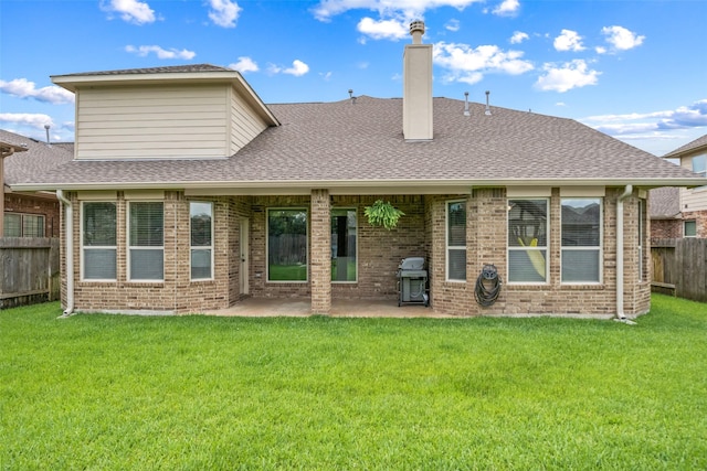 10002 Mahaffey Rd, Tomball, TX 77375 - back of house featuring a fenced backyard, roof with shingles, brick siding, and a patio