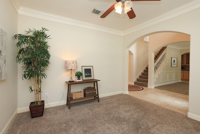 17430 Autumn Oak Way, Spring, TX 77379 - carpeted empty room with crown molding, a ceiling fan, arched walkways, and stairs