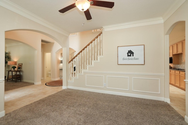 17430 Autumn Oak Way, Spring, TX 77379 - foyer featuring arched walkways, light carpet, ornamental molding, a ceiling fan, and stairway