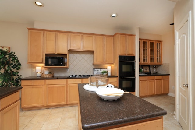 17430 Autumn Oak Way, Spring, TX 77379 - kitchen with black appliances, backsplash, light brown cabinetry, glass insert cabinets, and recessed lighting