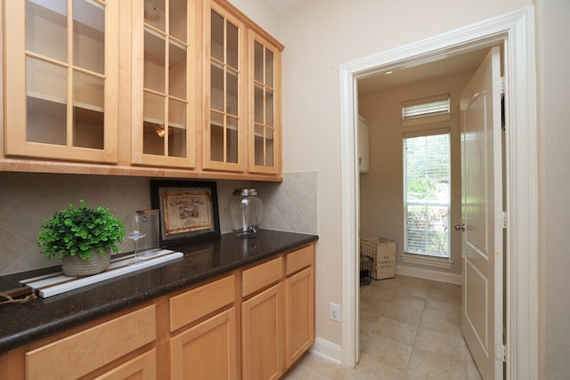 17430 Autumn Oak Way, Spring, TX 77379 - bar with backsplash and light tile patterned flooring