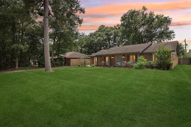 1135 Ivy Ln, Beaumont, TX 77706 - view of front of house with a lawn