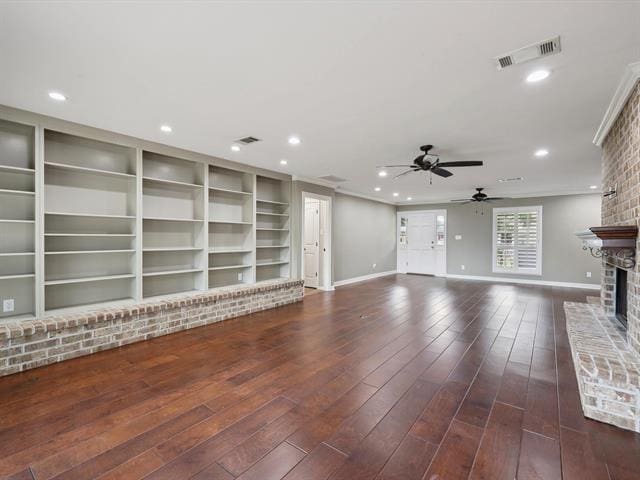 1135 Ivy Ln, Beaumont, TX 77706 - unfurnished living room with a fireplace, ceiling fan, recessed lighting, wood finished floors, and crown molding
