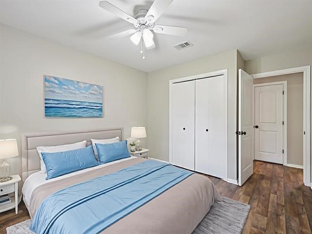 1135 Ivy Ln, Beaumont, TX 77706 - bedroom with a closet, wood finished floors, and ceiling fan