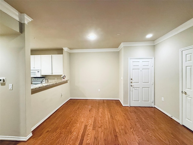 2400 Mccue Rd Unit 345, Houston, TX 77056 - interior space featuring crown molding, wood finished floors, and recessed lighting