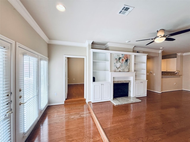 2400 Mccue Rd Unit 345, Houston, TX 77056 - unfurnished living room with ornamental molding, ceiling fan, a high end fireplace, wood finished floors, and recessed lighting