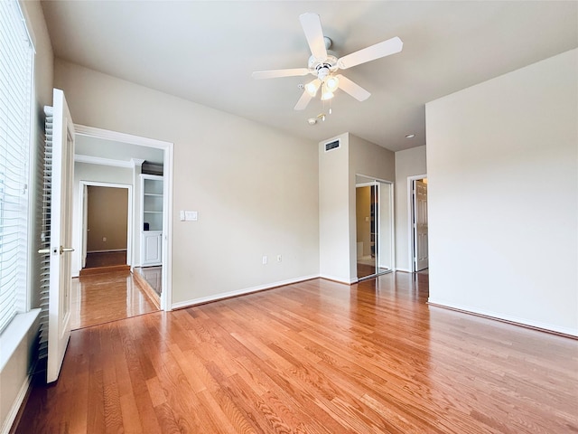 2400 Mccue Rd Unit 345, Houston, TX 77056 - unfurnished room featuring wood finished floors and a ceiling fan