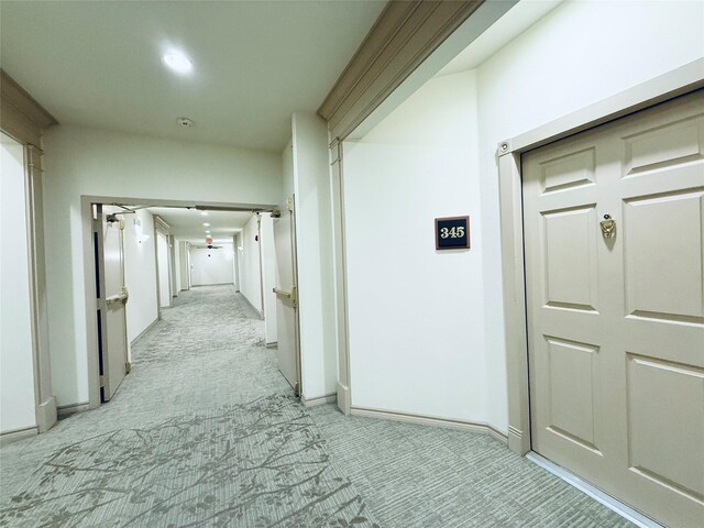 2400 Mccue Rd Unit 345, Houston, TX 77056 - corridor featuring light colored carpet and baseboards