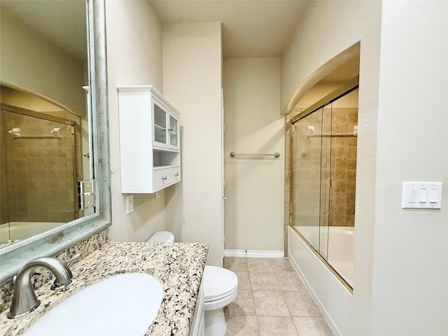 2400 Mccue Rd Unit 345, Houston, TX 77056 - full bath with vanity, enclosed tub / shower combo, and tile patterned flooring