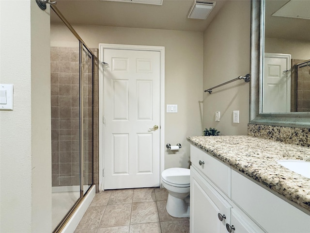 2400 Mccue Rd Unit 345, Houston, TX 77056 - bathroom with vanity, a stall shower, and tile patterned floors