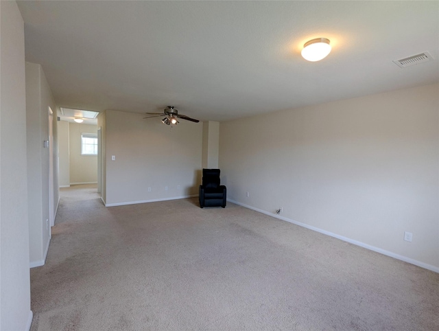 7206 Sunburst Meadow Dr, Houston, TX 77083 - unfurnished living room featuring a ceiling fan and light carpet