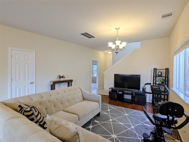 7206 Sunburst Meadow Dr, Houston, TX 77083 - living room with a chandelier and wood finished floors