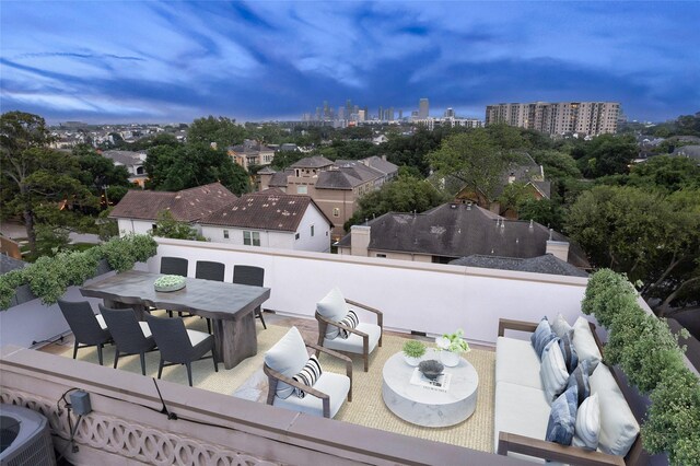 6506 Rodrigo St, Houston, TX 77007 - view of patio featuring a city view and outdoor dining area