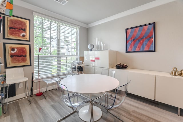 40 Snowdrop Lily Dr, Tomball, TX 77375 - dining area with light wood-type flooring and plenty of natural light