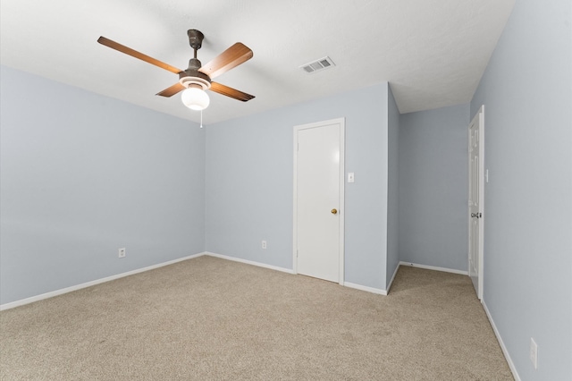 9310 Carvel Ln, Houston, TX 77036 - unfurnished bedroom featuring light carpet and ceiling fan