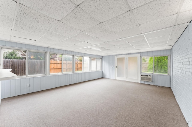 9310 Carvel Ln, Houston, TX 77036 - unfurnished sunroom featuring a wall mounted air conditioner