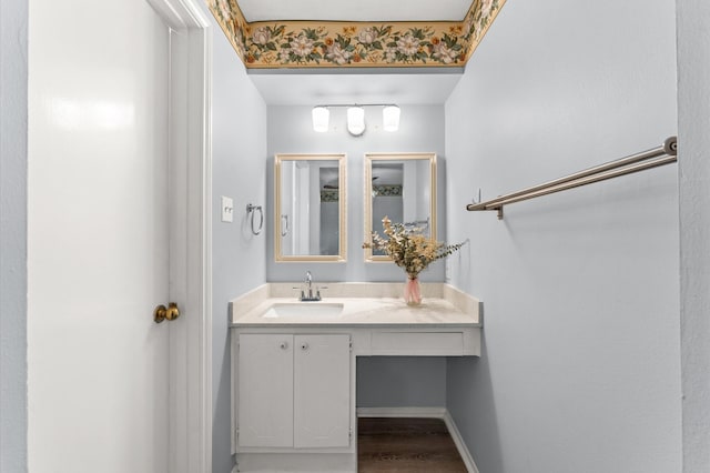 9310 Carvel Ln, Houston, TX 77036 - bathroom featuring vanity and wood finished floors