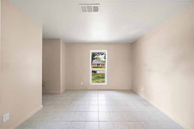 741 Rutgers Ln, Deer Park, TX 77536 - empty room featuring baseboards and light tile patterned floors