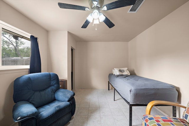 741 Rutgers Ln, Deer Park, TX 77536 - bedroom with light tile patterned flooring and a ceiling fan