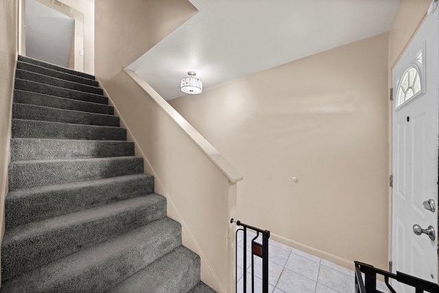 741 Rutgers Ln, Deer Park, TX 77536 - staircase with tile patterned flooring and baseboards