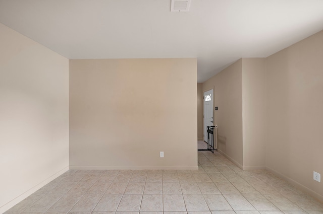 741 Rutgers Ln, Deer Park, TX 77536 - unfurnished room with light tile patterned floors and baseboards