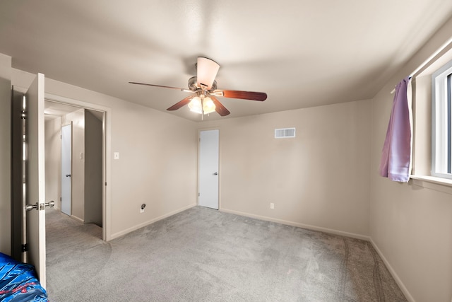 741 Rutgers Ln, Deer Park, TX 77536 - unfurnished bedroom featuring carpet flooring and a ceiling fan