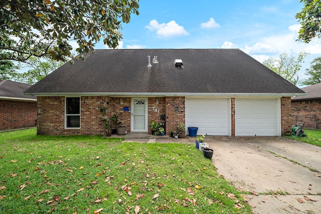 741 Rutgers Ln, Deer Park, TX 77536 - view of front facade featuring a garage, concrete driveway, brick siding, and a front yard