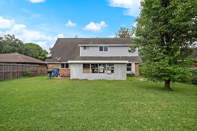 741 Rutgers Ln, Deer Park, TX 77536 - rear view of house featuring brick siding and a shingled roof