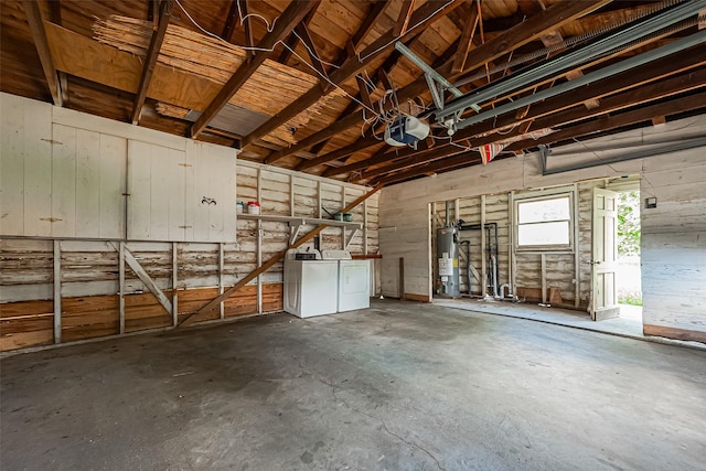 227 Lakeview Dr, Sugar Land, TX 77498 - garage with separate washer and dryer, a garage door opener, and gas water heater