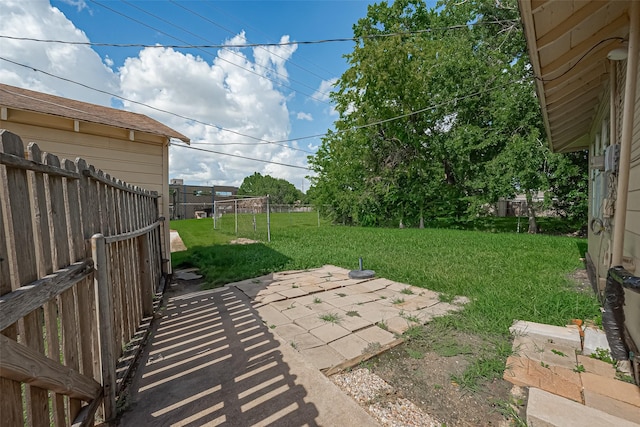 227 Lakeview Dr, Sugar Land, TX 77498 - fenced backyard with a patio area