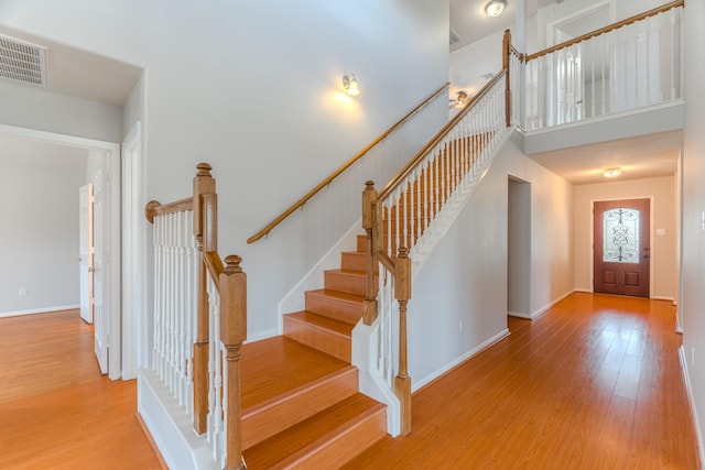 17203 Morning Blossom Pl, Houston, TX 77084 - stairway featuring wood finished floors