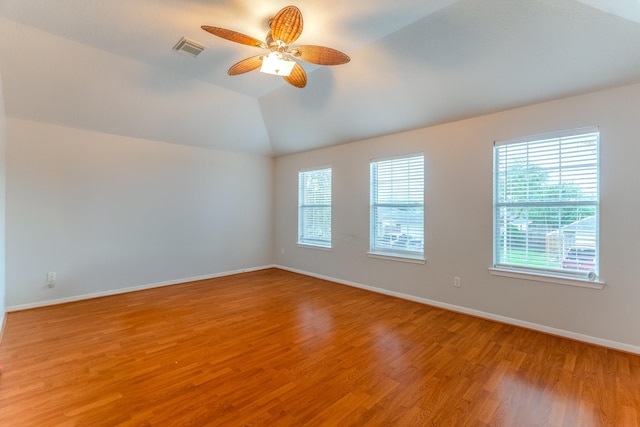 17203 Morning Blossom Pl, Houston, TX 77084 - spare room with plenty of natural light, light wood-style floors, a ceiling fan, and vaulted ceiling