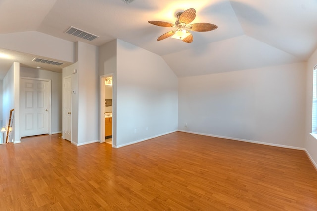 17203 Morning Blossom Pl, Houston, TX 77084 - additional living space with vaulted ceiling, a ceiling fan, and light wood-type flooring