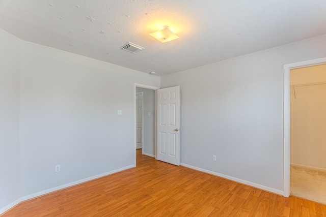 17203 Morning Blossom Pl, Houston, TX 77084 - unfurnished room featuring light wood-type flooring and baseboards