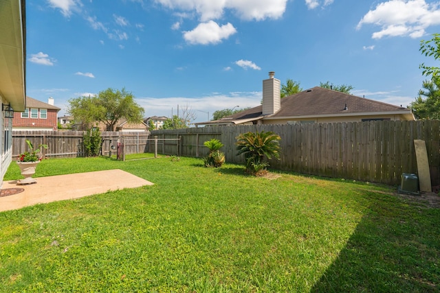 17203 Morning Blossom Pl, Houston, TX 77084 - fenced backyard with a patio area