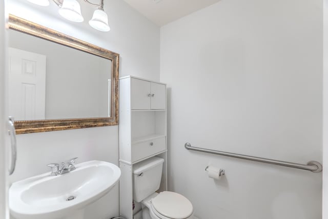 17203 Morning Blossom Pl, Houston, TX 77084 - half bathroom featuring a sink and toilet