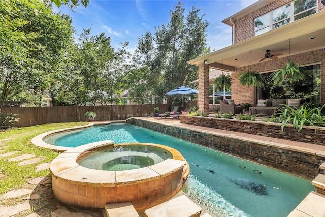 130 Amulet Oaks Ct, The Woodlands, TX 77382 - view of swimming pool with a ceiling fan, a fenced backyard, an outdoor hangout area, a pool with connected hot tub, and a patio area
