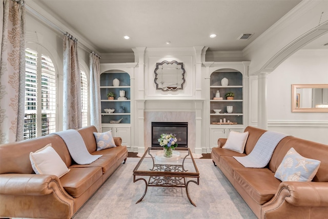 130 Amulet Oaks Ct, The Woodlands, TX 77382 - living area featuring crown molding, a fireplace, and recessed lighting