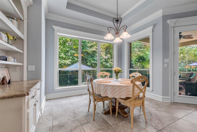 130 Amulet Oaks Ct, The Woodlands, TX 77382 - dining space featuring healthy amount of natural light, a chandelier, ornamental molding, and light tile patterned floors