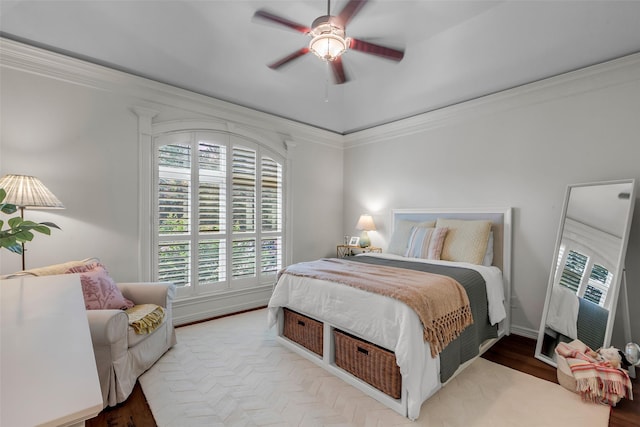 130 Amulet Oaks Ct, The Woodlands, TX 77382 - bedroom featuring ornamental molding, a ceiling fan, and wood finished floors