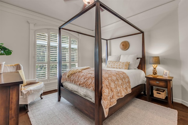 130 Amulet Oaks Ct, The Woodlands, TX 77382 - bedroom featuring wood finished floors and ornamental molding