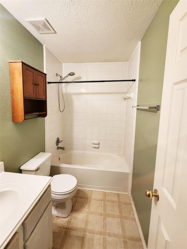 14631 Timber Cliff Ln, Cypress, TX 77429 - bathroom with a textured ceiling, vanity, and shower / bathtub combination