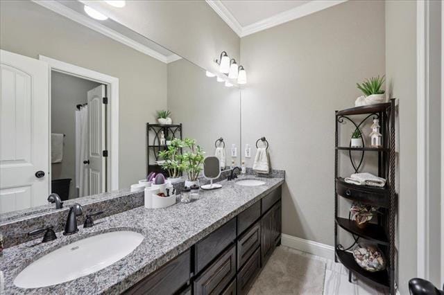 271 Hannah Ln, Lumberton, TX 77657 - bathroom featuring double vanity and ornamental molding