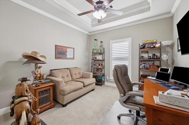 271 Hannah Ln, Lumberton, TX 77657 - carpeted office space featuring a raised ceiling, a ceiling fan, and crown molding